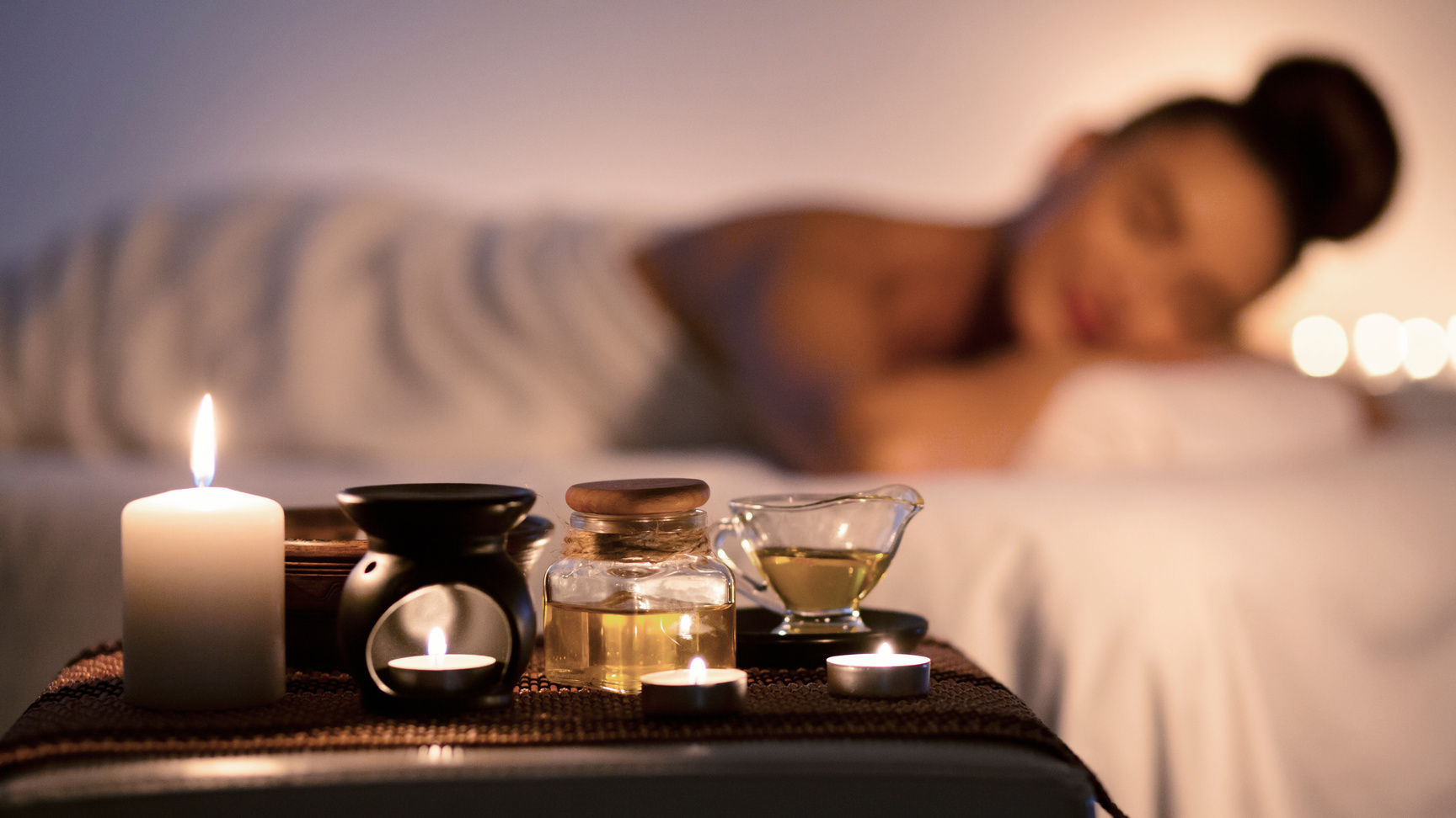 Aroma massage concept. Lady relaxing in spa, panorama